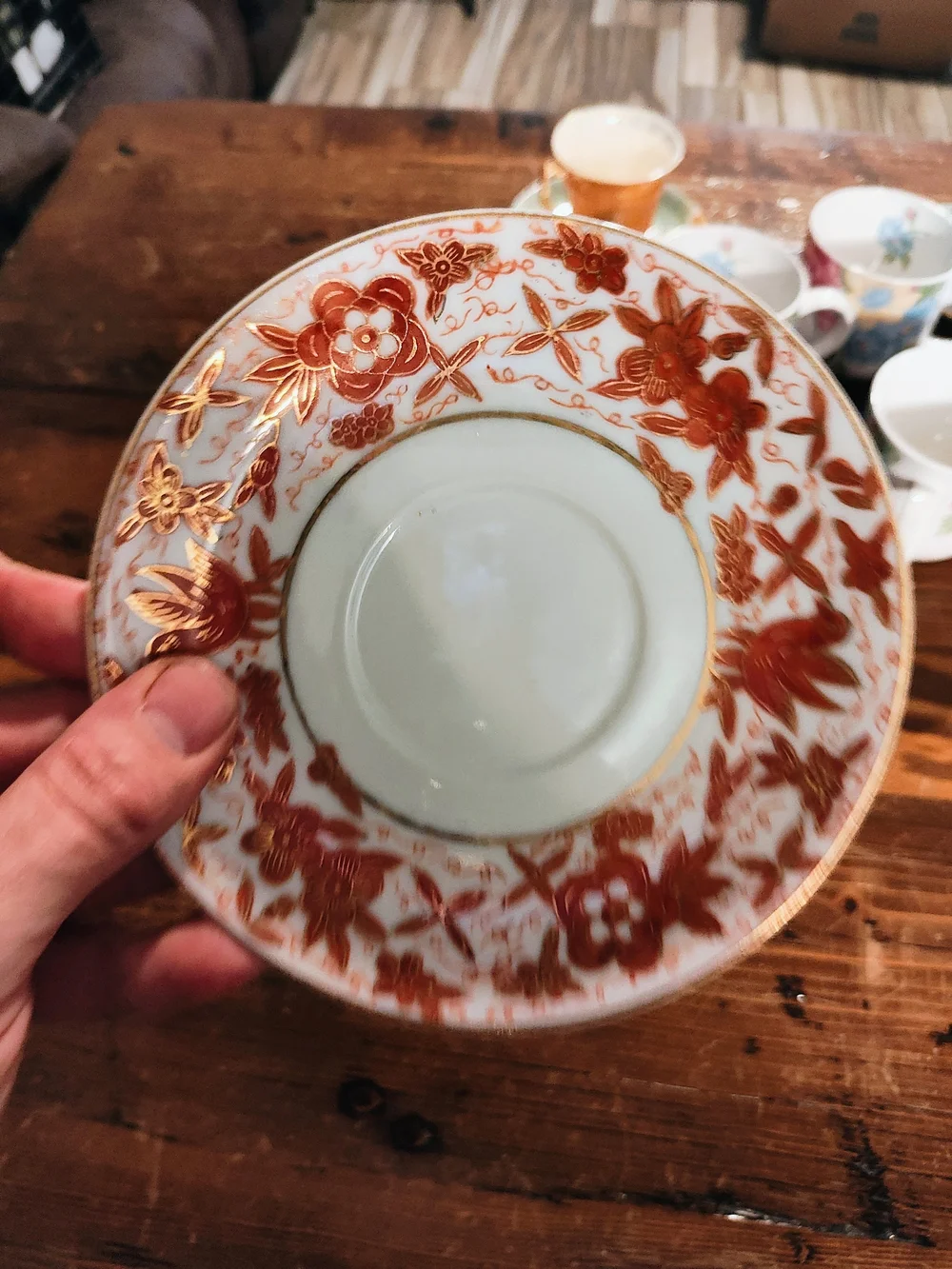 Porcelain Teacup and Saucer - White with Rust Floral Pattern